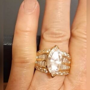 Marquise Center Stone with Round and Baguette Channel Set Size 6 Ring